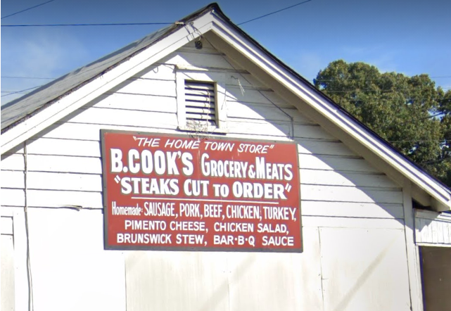 B . Cook's Grocery & Meats 'Steaks Cut to Order'